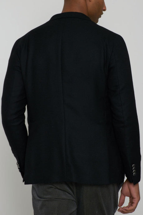 Tagliatore giacca uomo bouclè