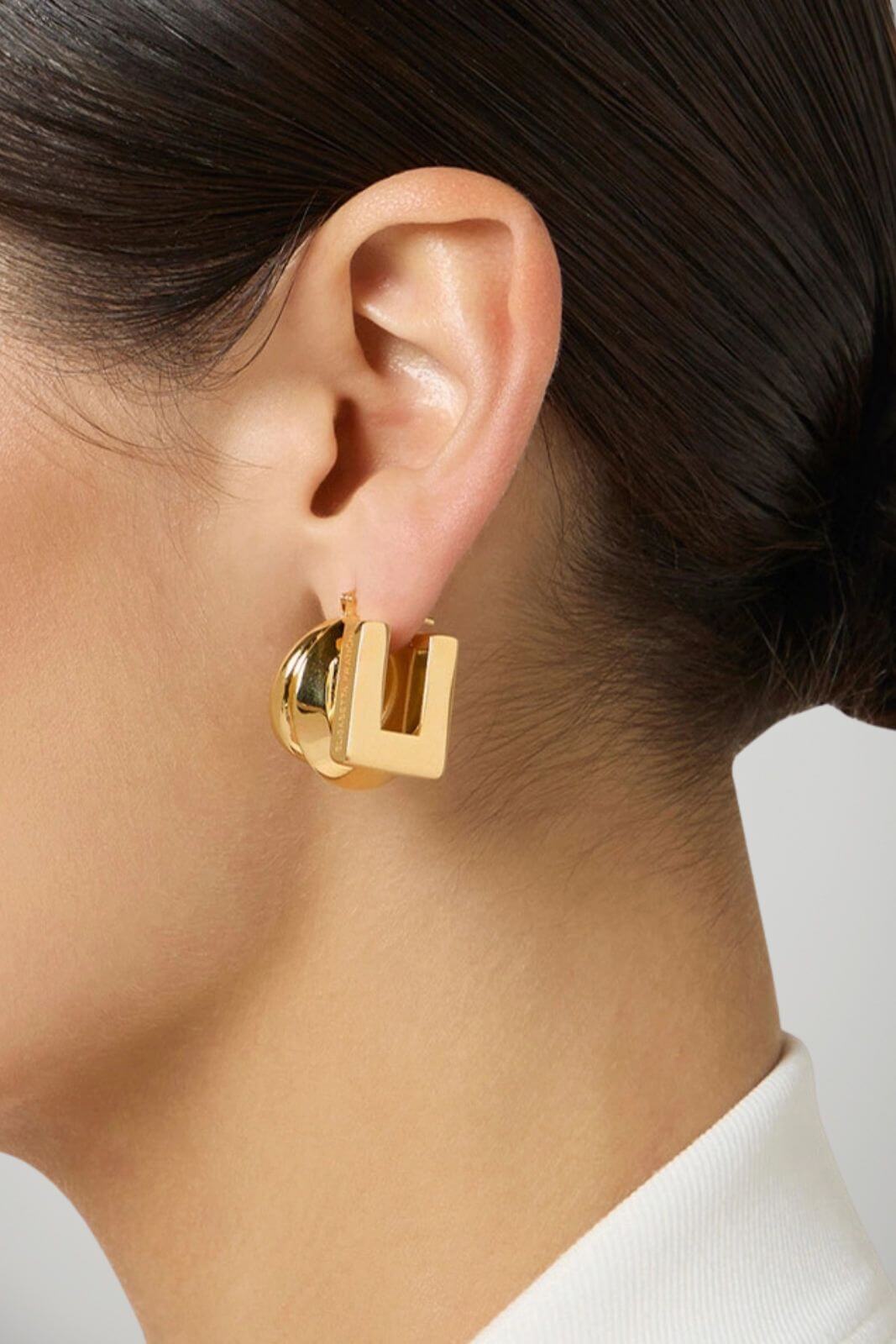 Elisabetta Franchi Orecchini Donna in metallo dorato con logo inciso