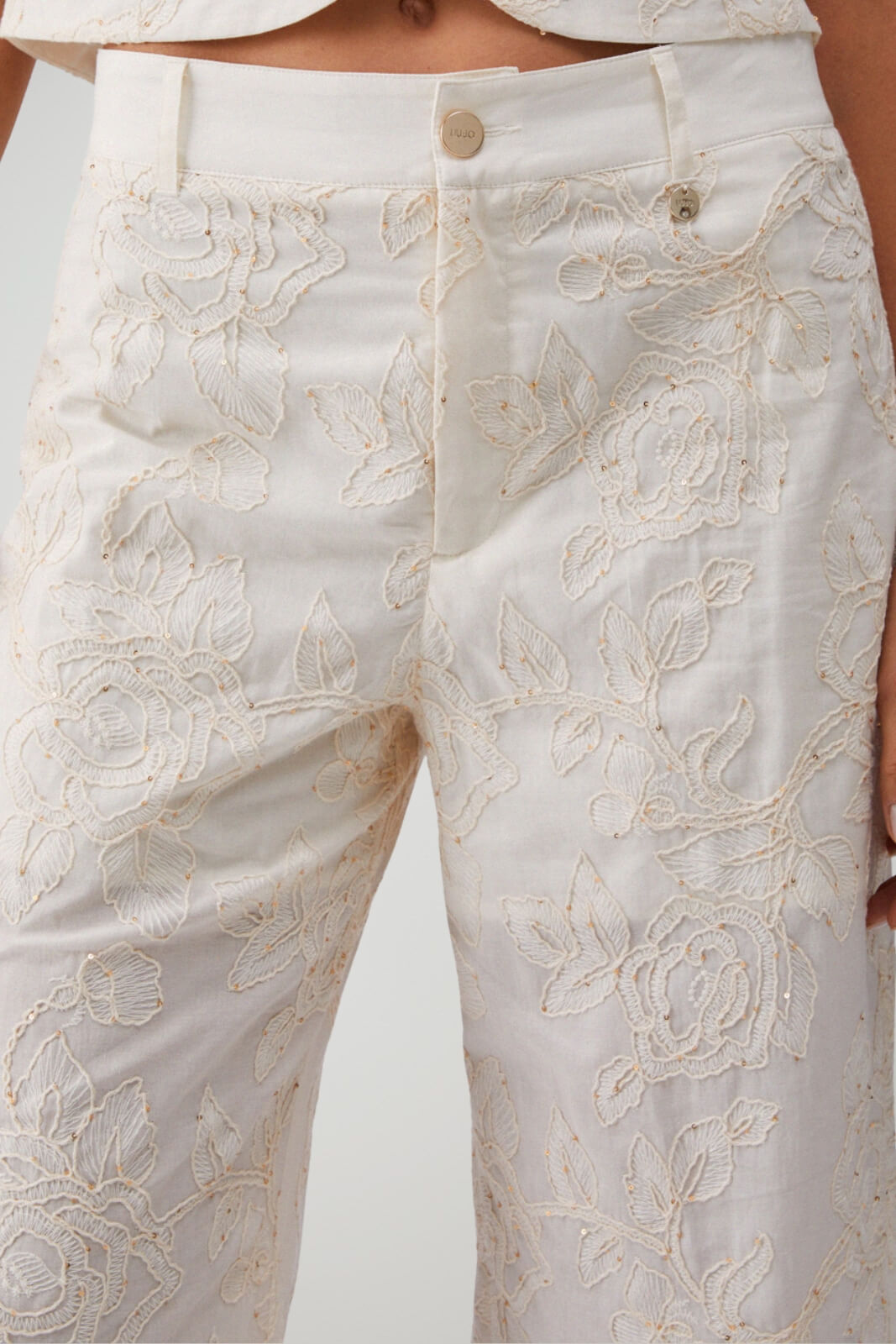 Pantaloni donna Liu Jo in mussola di cotone con micro paillettes a vita media in tinta unita avorio