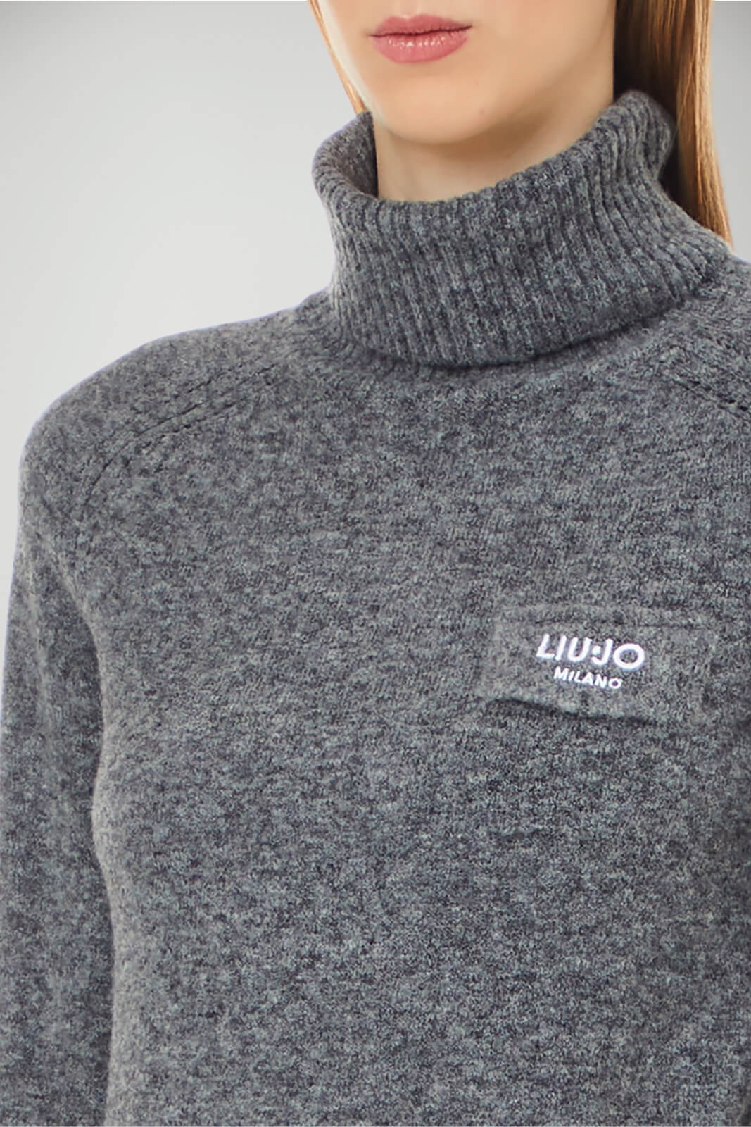 Dolcevita da donna in melange con finto taschino logato