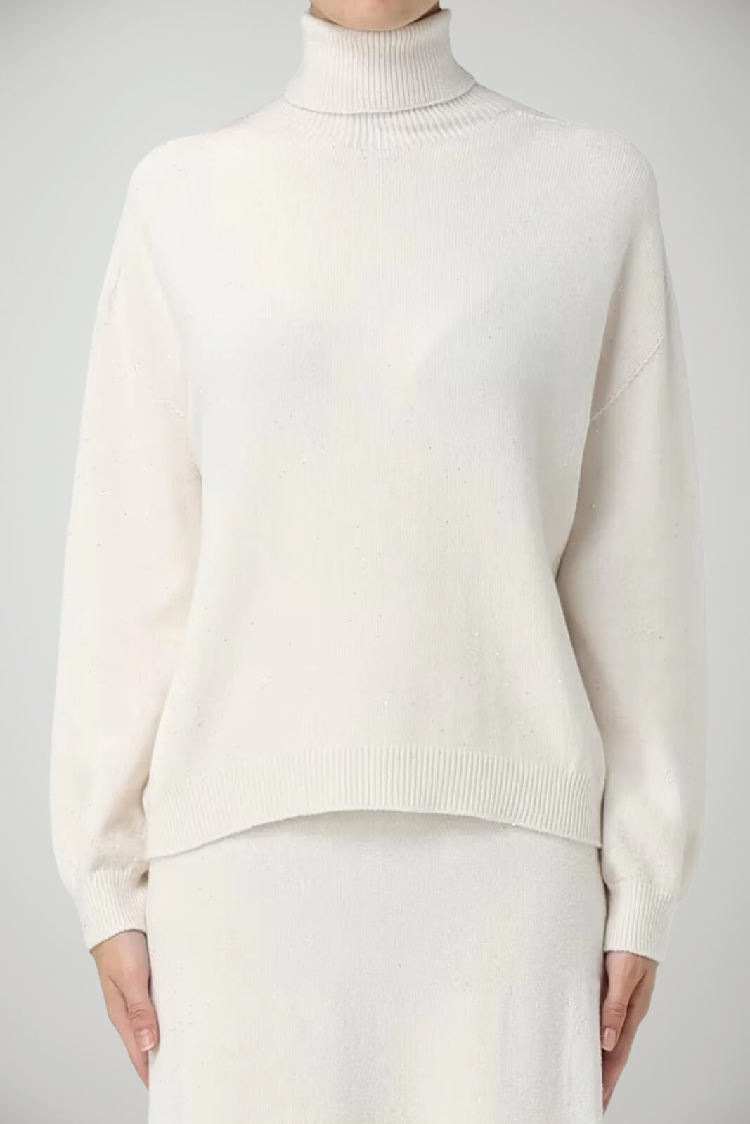 Dolcevita da donna con paillettes a tinta unita fronte 1