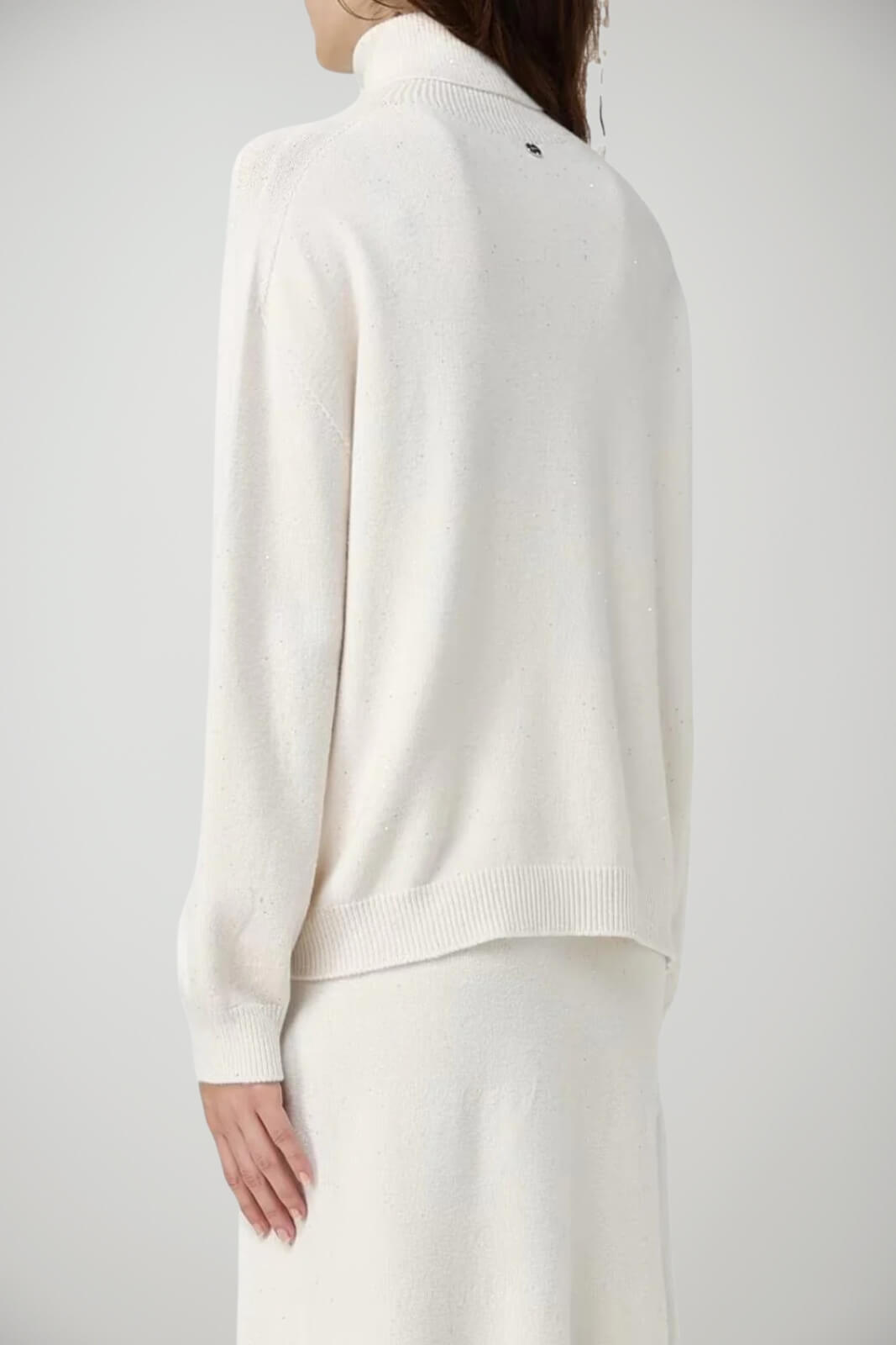 Dolcevita da donna con paillettes a tinta unita retro