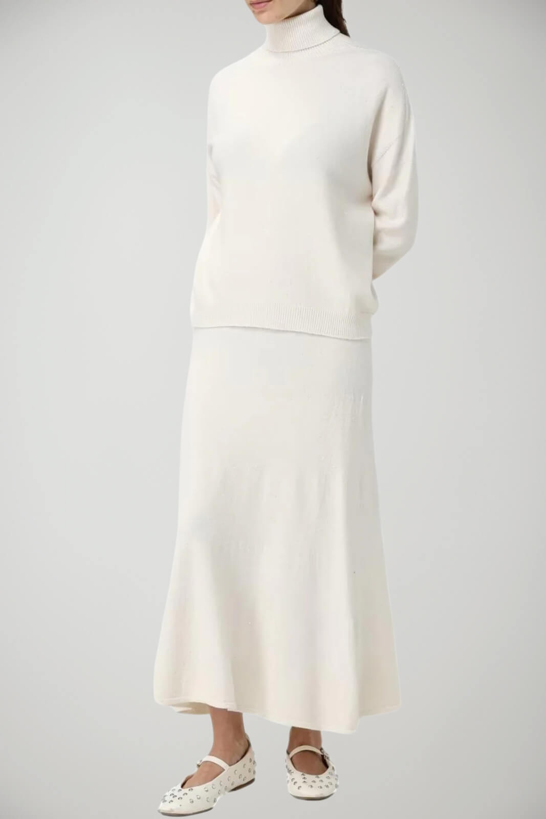 Dolcevita da donna con paillettes a tinta unita outfit