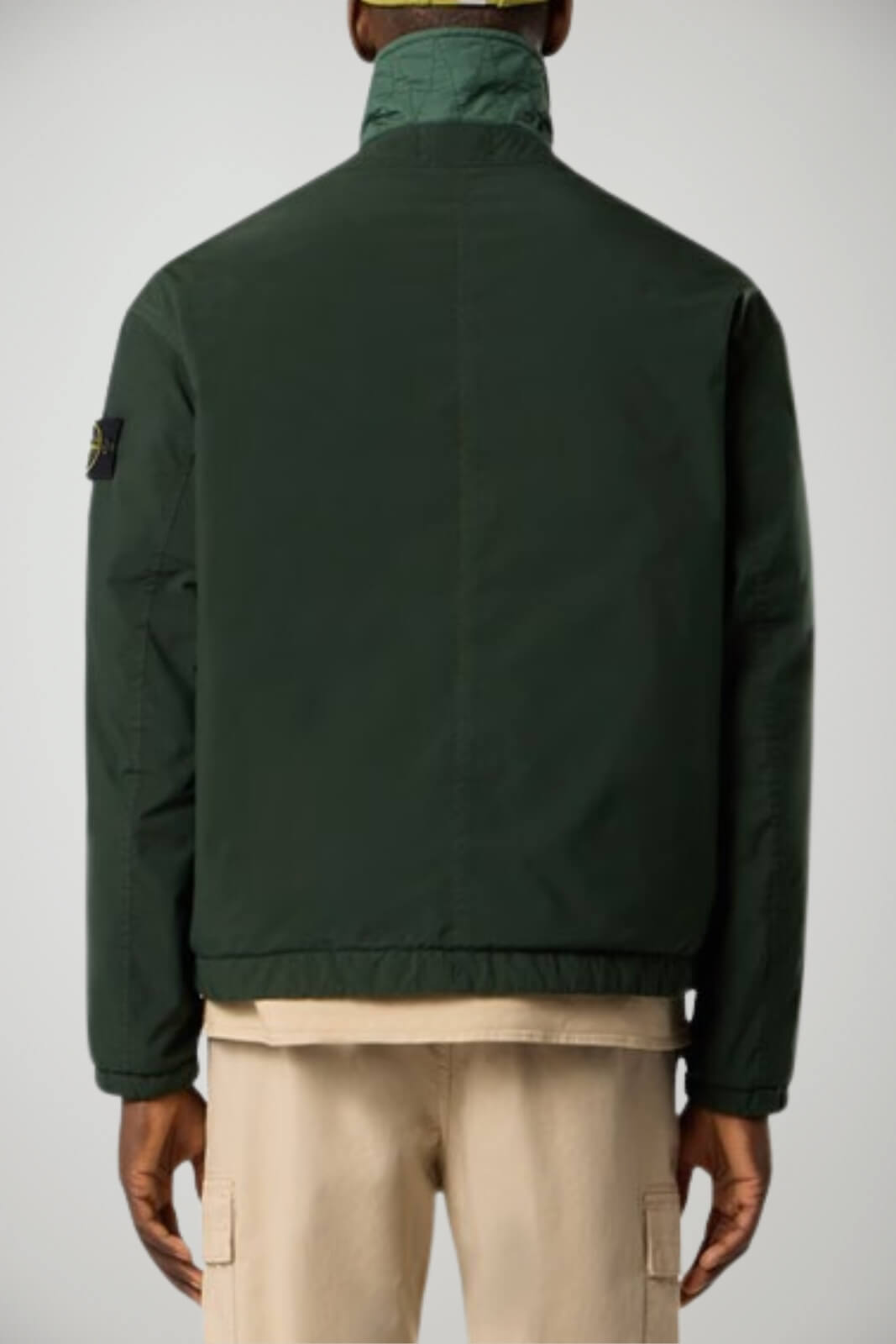 Giubbino uomo Stone Island con collo alto e tasche a patta retro