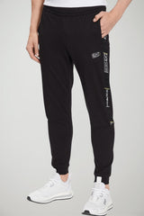 Emporio Armani Pantaloni Uomo con bande logate in gros grain