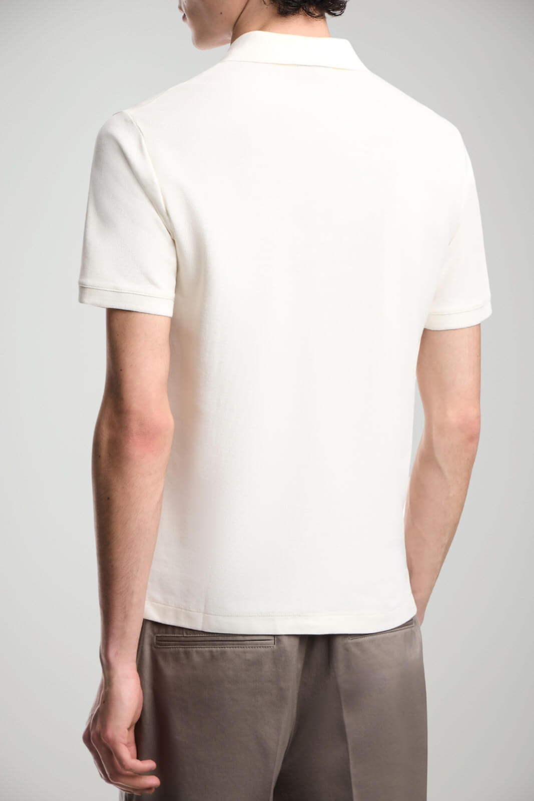 Polo uomo Emporio Armani in cotone slim fit in tinta unita color panna