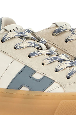 Sneakers da donna Hogan con logo laterale e suola alta chunky