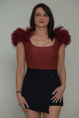 Revise Body Women with pom poms on the shoulders