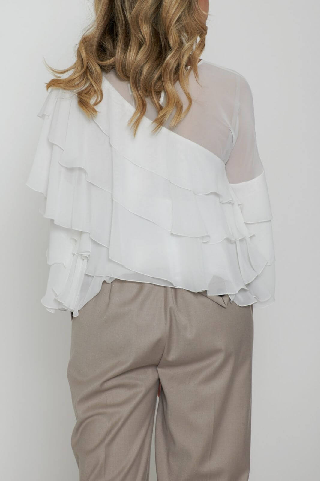 Blusa de mujer con volantes Revisa