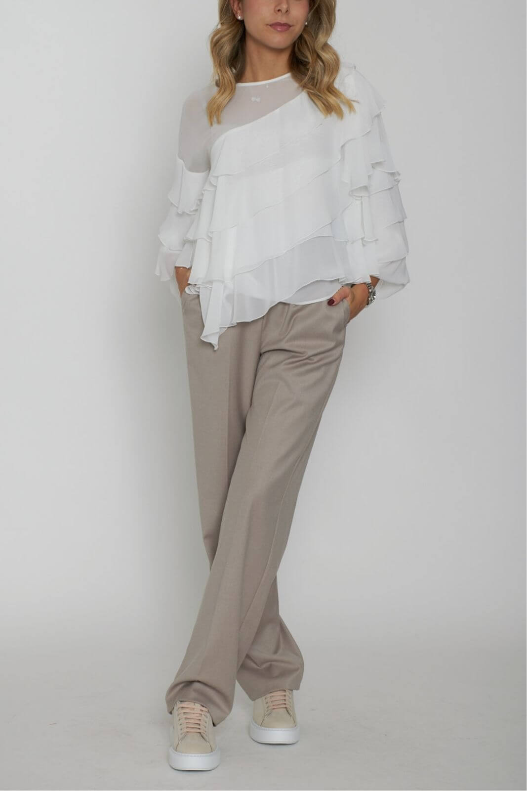 Blusa de mujer con volantes Revisa
