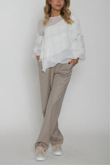 Blusa de mujer con volantes Revisa