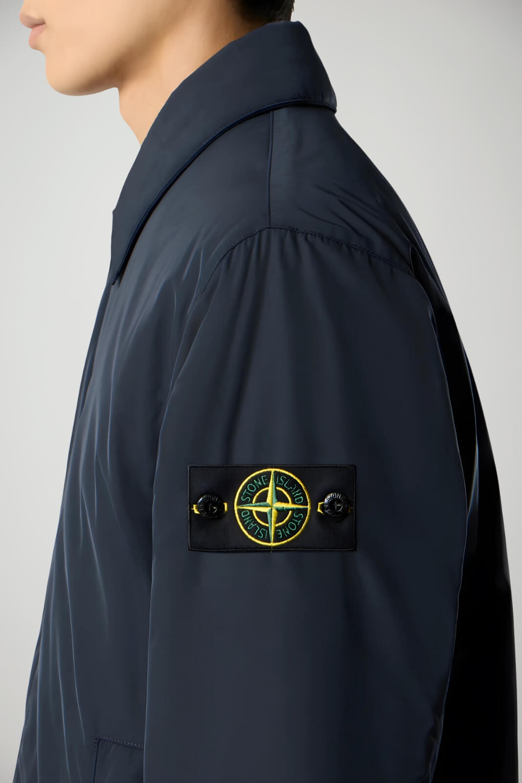 Giaccone da uomo Stone Island in tessuto tecnico dettaglio