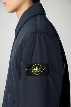 Giaccone da uomo Stone Island in tessuto tecnico dettaglio