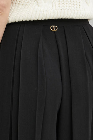 Pantaloni da donna Twinset con plissè e vita alta